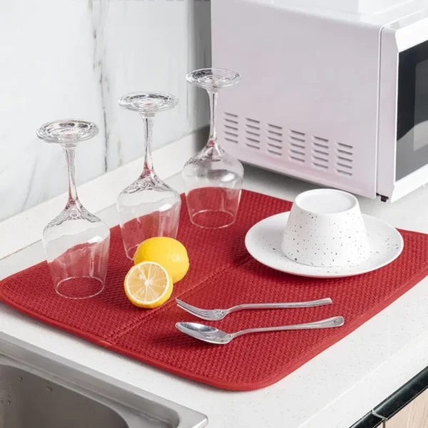 Kitchen countertop drying mat protecting marble surface from scratches and water damage