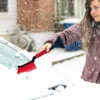 Soft bristle snow brush on 2-in-1 car tool, sweeps snow without scratching paint