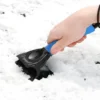 Ergonomic non-slip padded handle with thumb rest on car ice scraper, keeps hands warm and comfortable