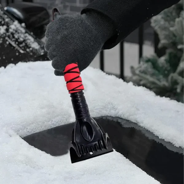 ice-scraper-removing-thick-ice-from-windshield Colorful cross-grip ice scraper removing thick ice from car windshield, fast and scratch-free