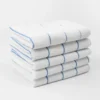 Microfiber kitchen towel absorbing water, 6x its weight in seconds