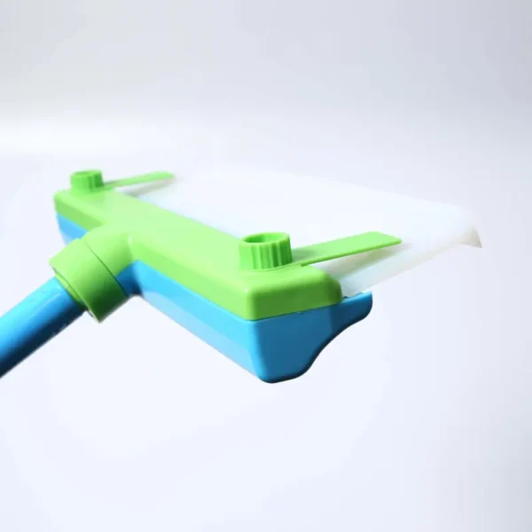 Close-up of flexible silicone blade and high-absorption microfiber pad on window squeegee